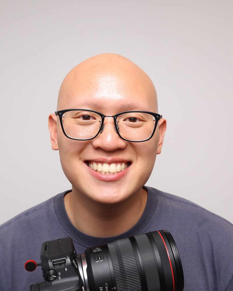 Nathan Tran, founder of Stella Booth, holding his camera