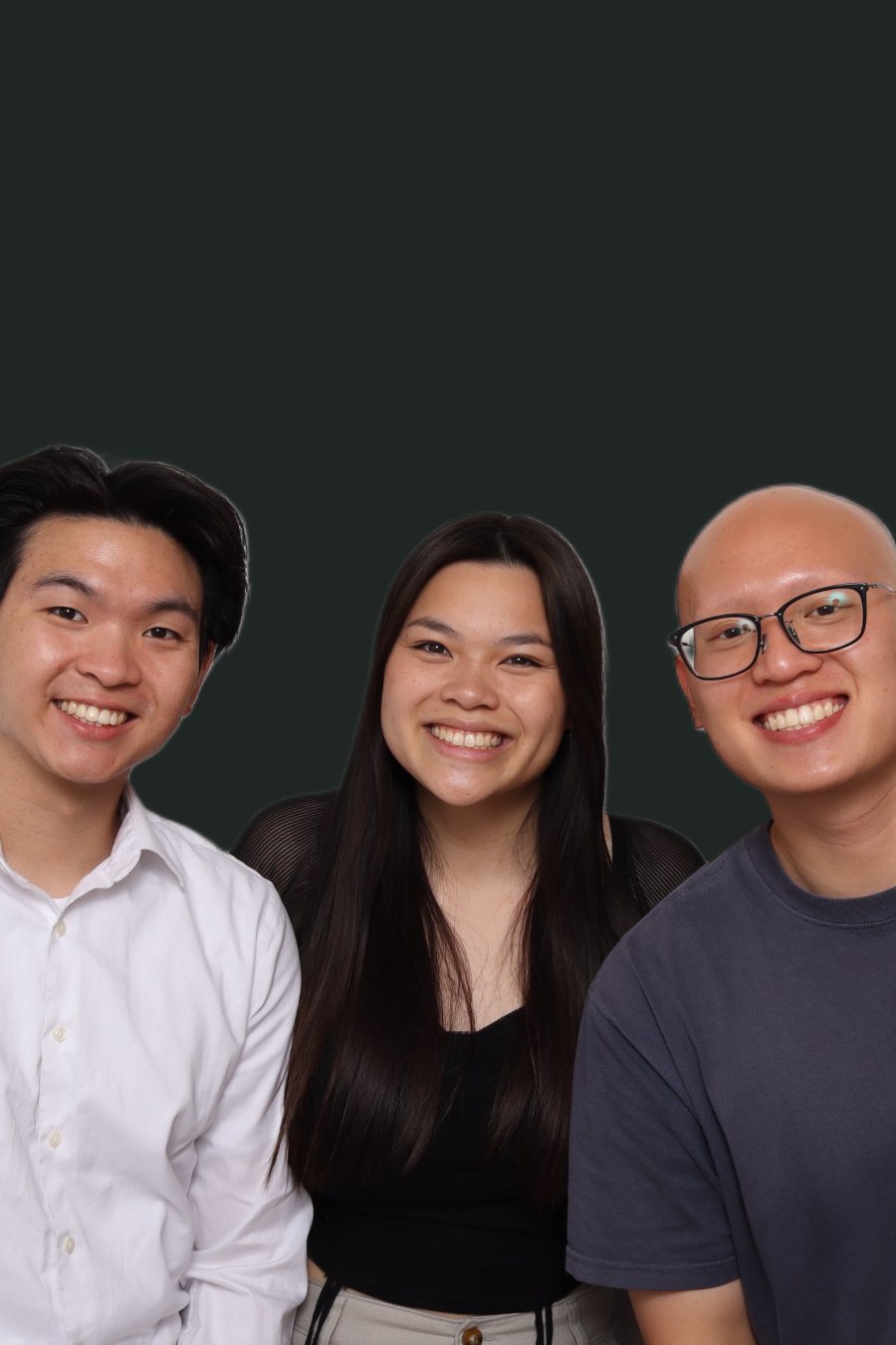 A group of three guests posing together in the Stella Booth